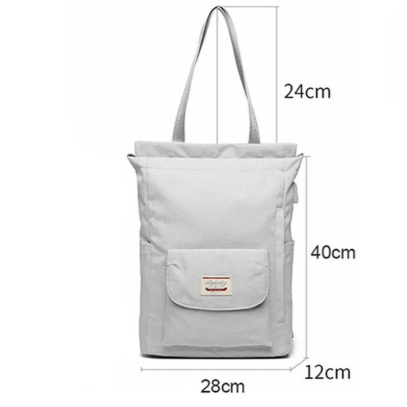 zoom sur un sac à dos femme gris avec sangles