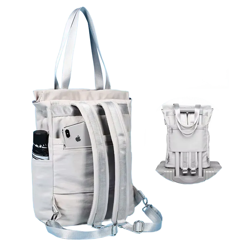 Image Sac posé sur une valise avec sangle arrière pour voyage 