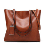 Grand sac ordinateur en cuir synthétique pour femme - Vignette | Sacs Ordinateur